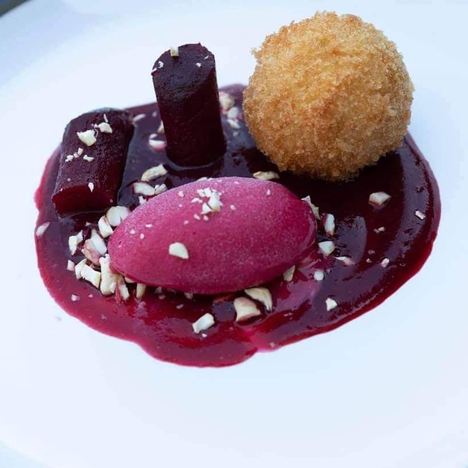 Goat cheese bon bon's, beetroot sorbet, beetroot coulis, nuts Caesars at the dolphin essex braintree resturant essex